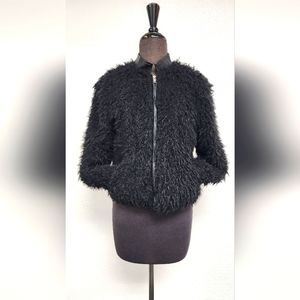 Black faux fur coat